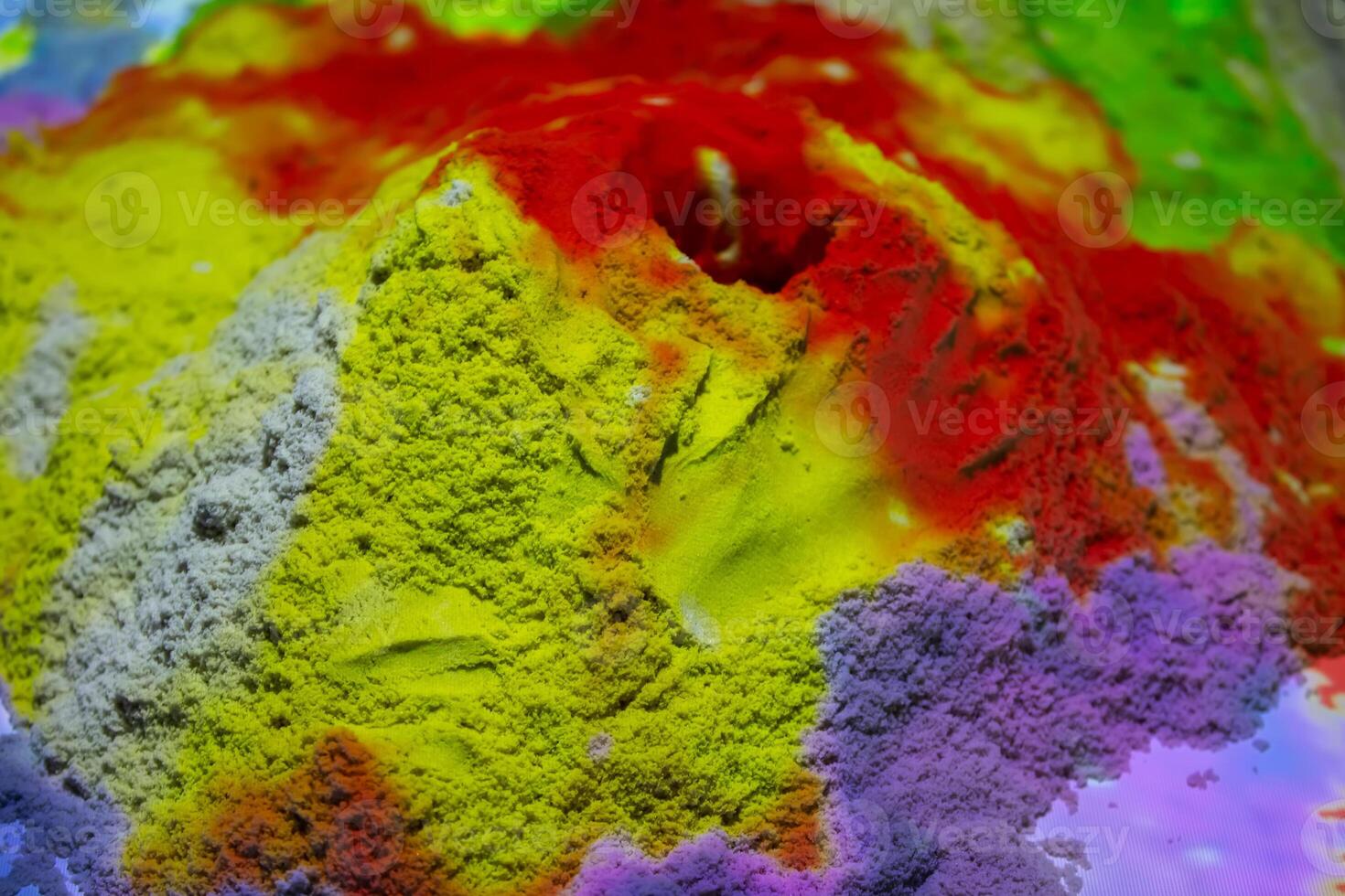 A close-up of a multicolored kinetic sand photo