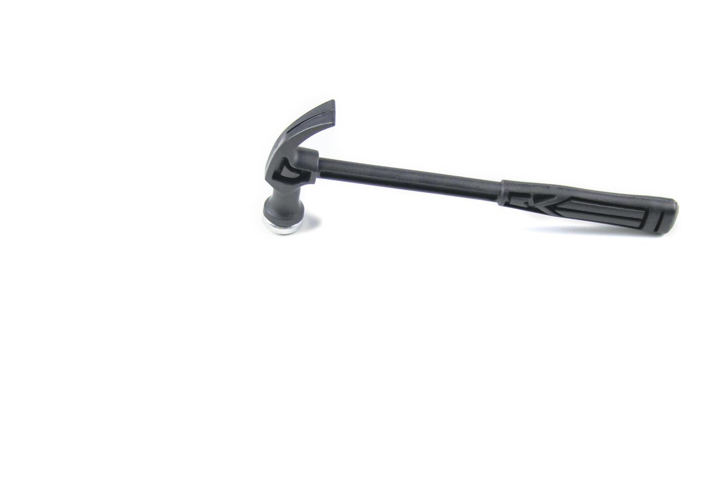 A durable hammer, essential for construction and repair, stands cut out on a white background. It symbolizes strength and craftsmanship. photo