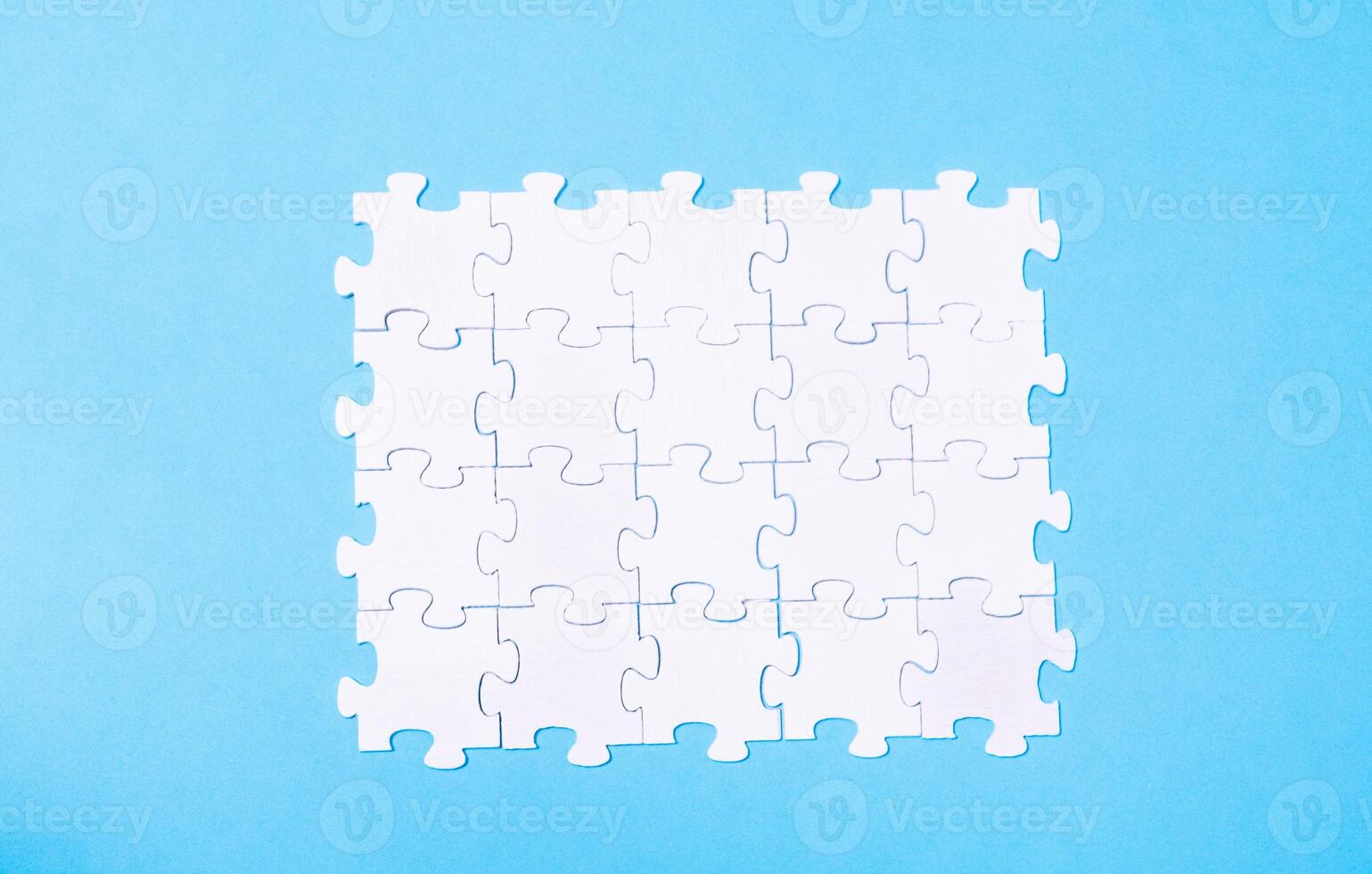 A puzzle piece is missing from a puzzle photo