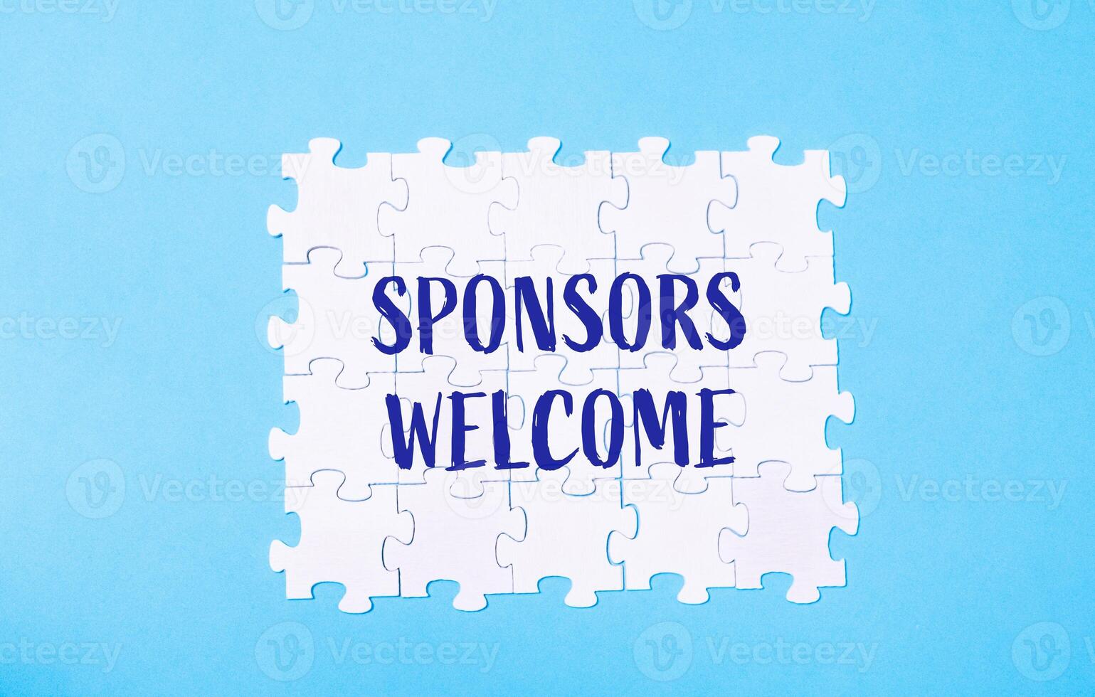 A jigsaw puzzle with the words sponsors welcome written on it photo
