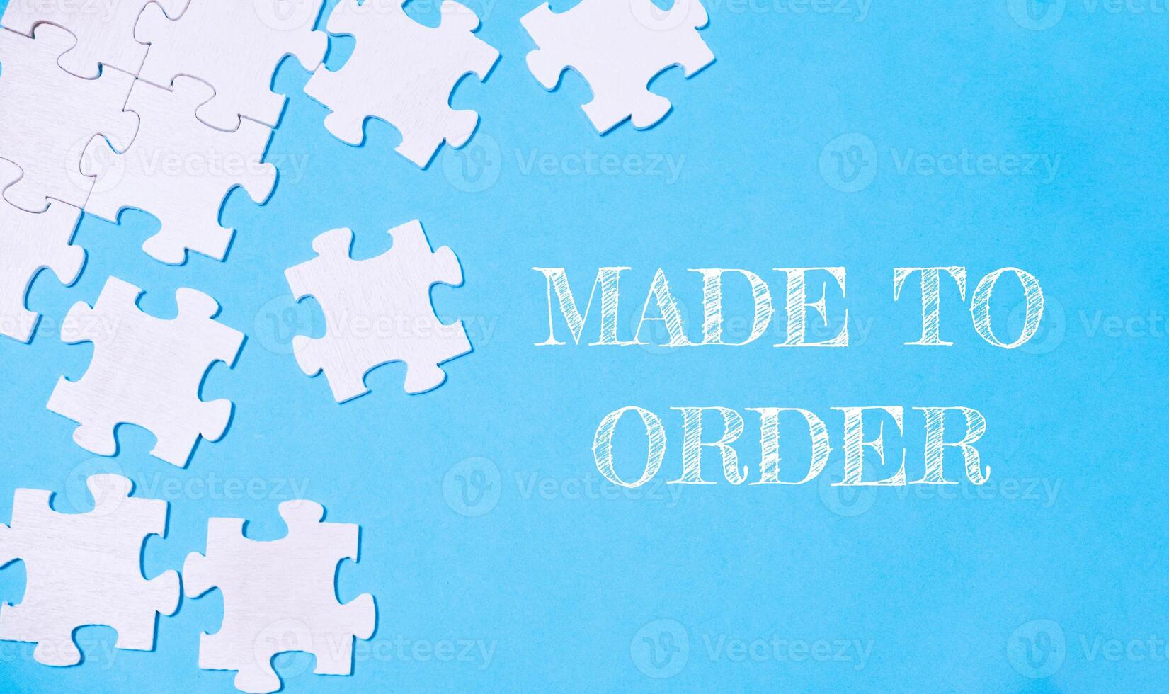 A jigsaw puzzle with the words Made to Order written above it photo