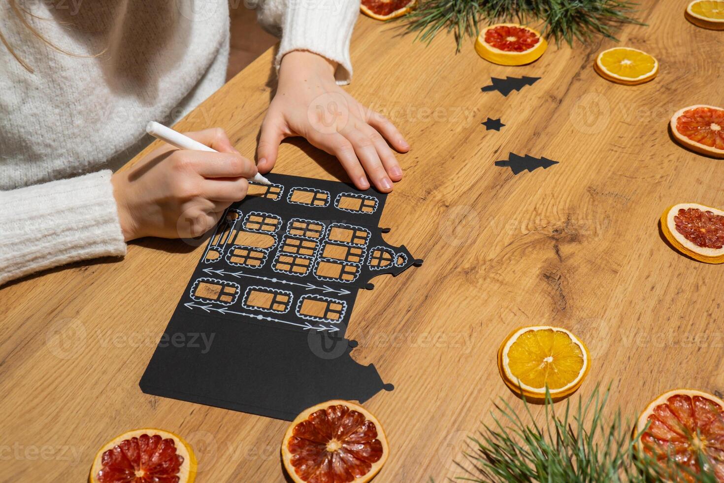 Christmas Gingerbread Village Paper black House Sustainable preparation Diy process of making handmade decoration. Step by step activity for children. Inclusive and responsible stress relief holiday hobby. Conscious celebration photo