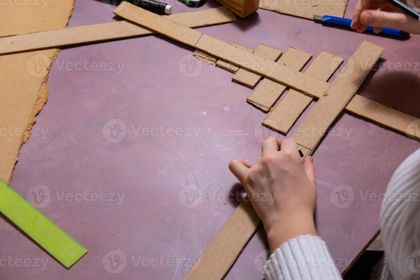 Wooden Christmas tree handmade Storytelling creating craft Christmas holiday decoration. Tactile hand-on activity. Master class progress of creative me-made gifts. Seasonal domestic life micro moment hobby. Sustainable living photo