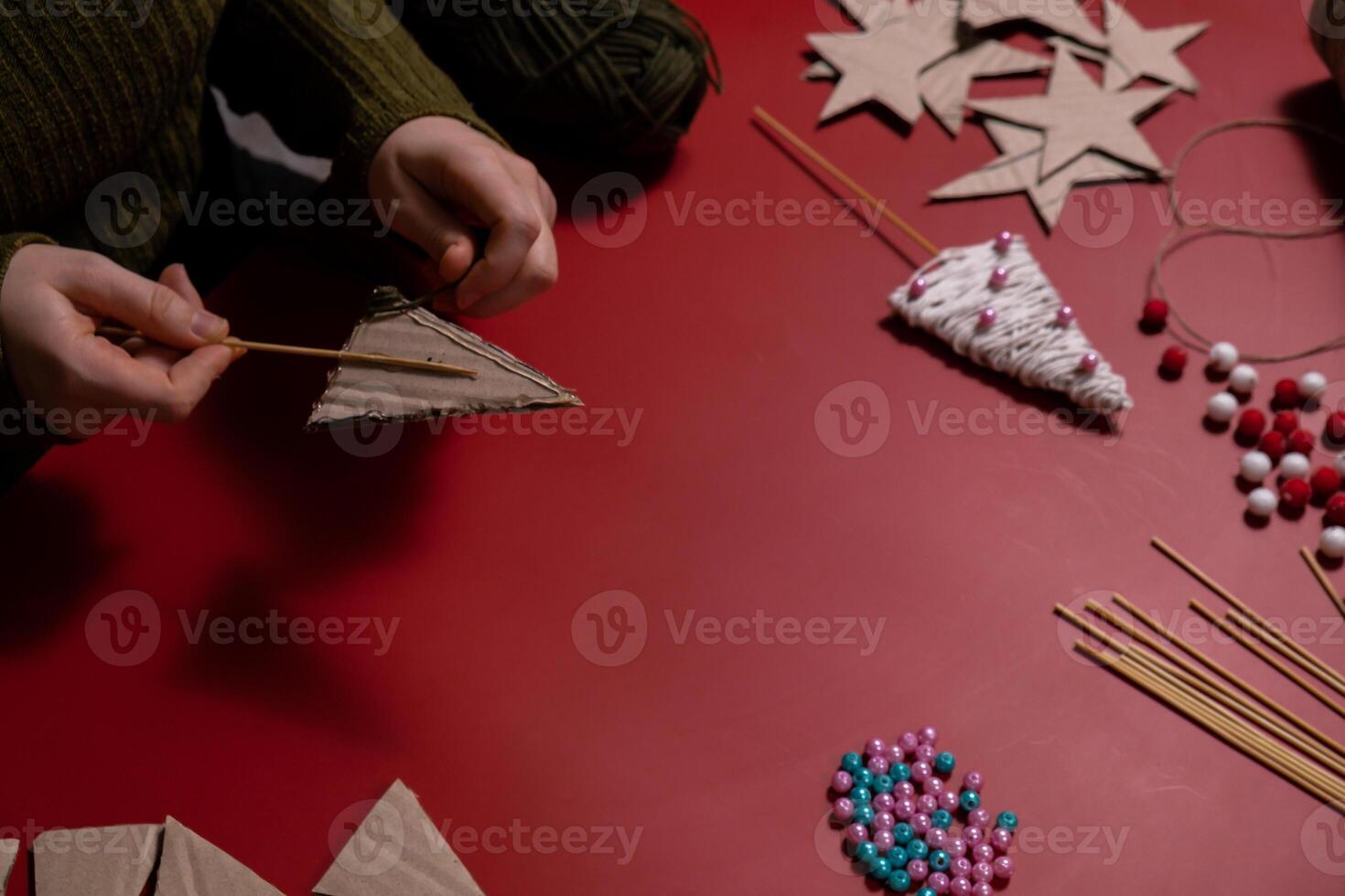 Christmas trees made of rope Sustainable Christmas preparation Diy process of making handmade decor. Step by step activity for children. Inclusive and responsible stress relief holiday hobby. Conscious celebration photo