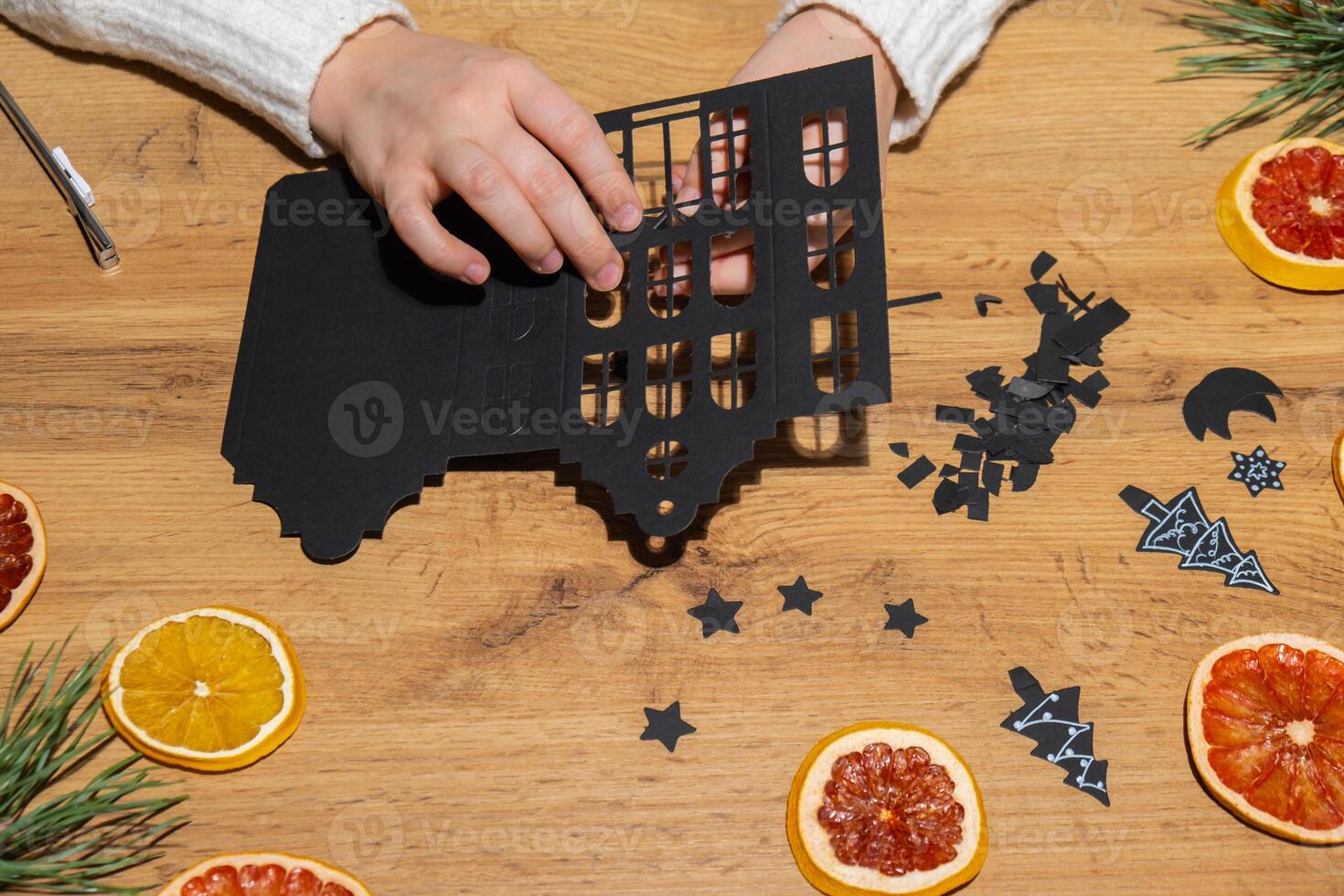 Christmas Gingerbread Village Paper black House Sustainable preparation Diy process of making handmade decoration. Step by step activity for children. Inclusive and responsible stress relief holiday hobby. Conscious celebration photo