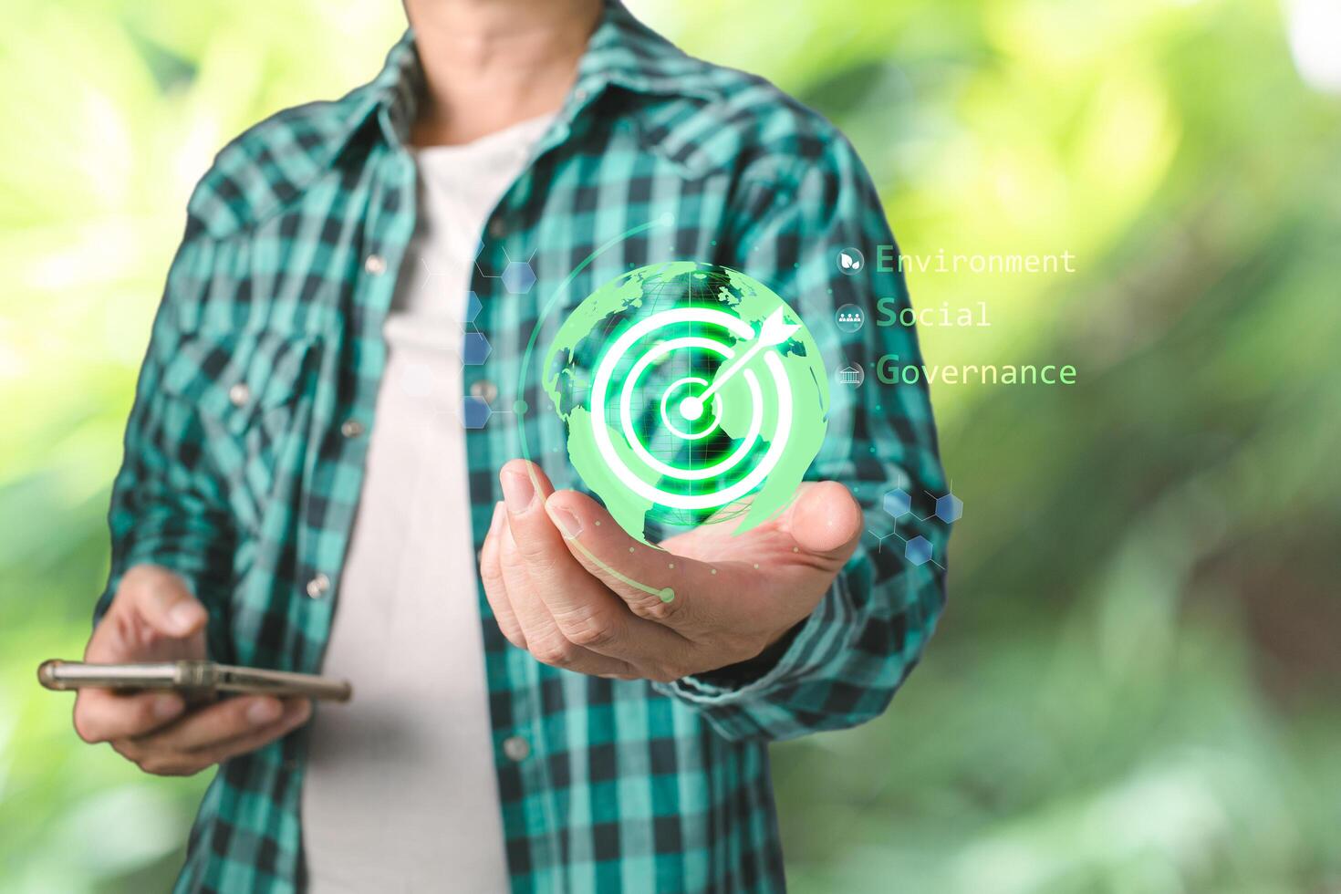 person hold technology icon to save energy,and reduce global warming,ecology friendly investment,ESG environment social governance,nature green Business Innovation and Sustainable Development concept. photo