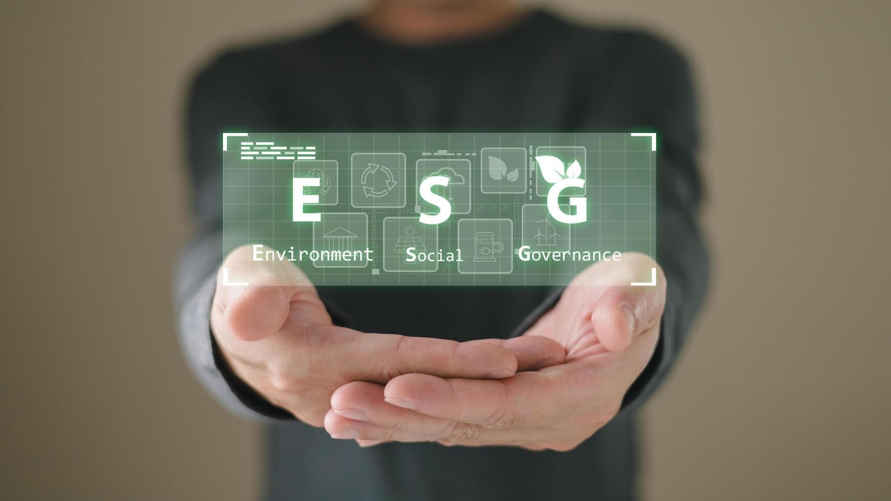 hand hold hologram to save energy,and reduce global warming,climate change,ecology friendly investment,ESG environment social governance,Green Business Innovation and Sustainable Development concept. photo