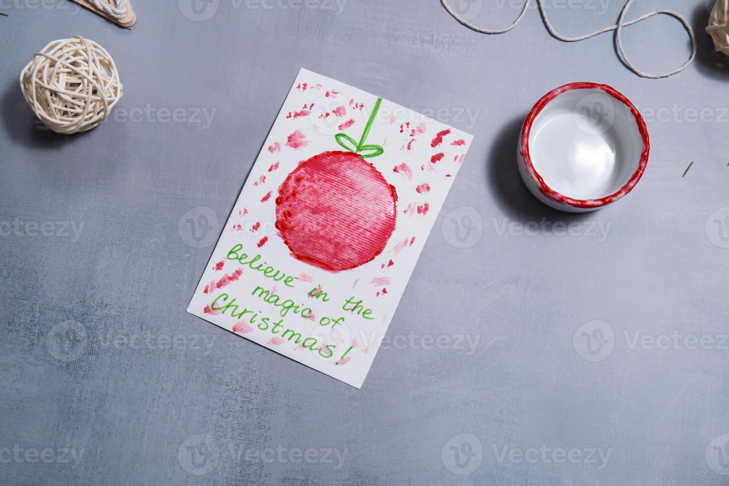 Christmas ball Storytelling of creating craft Christmas greeting card holiday present. Tactile hand-on activity. Master class progress of creative me-made gifts. Seasonal domestic life micro moment hobby. Sustainable living photo