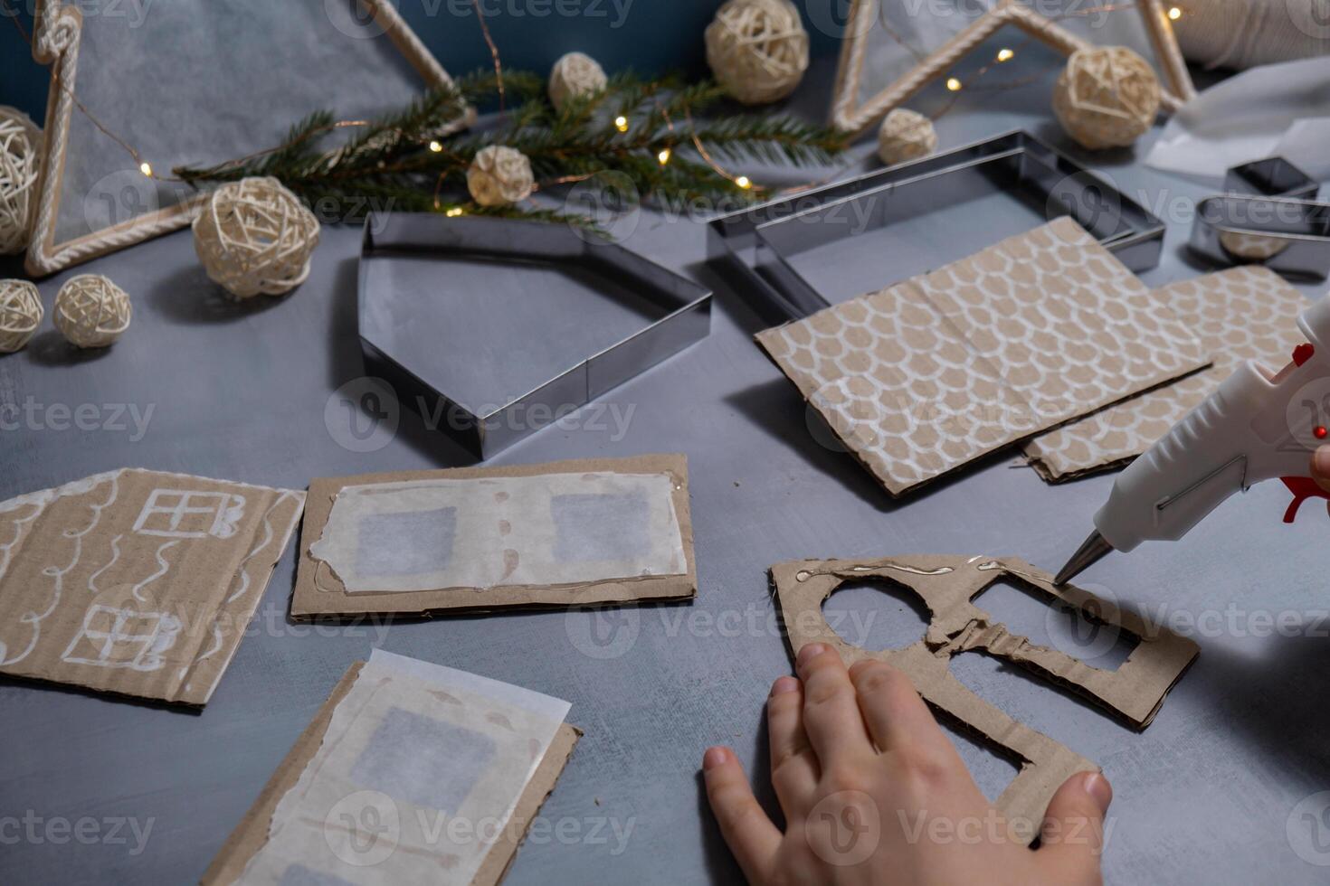 Cardboard paper Lantern House Sustainable Christmas preparation Diy process of making handmade. Step by step activity for children. Inclusive and responsible stress relief holiday hobby. Conscious celebration photo