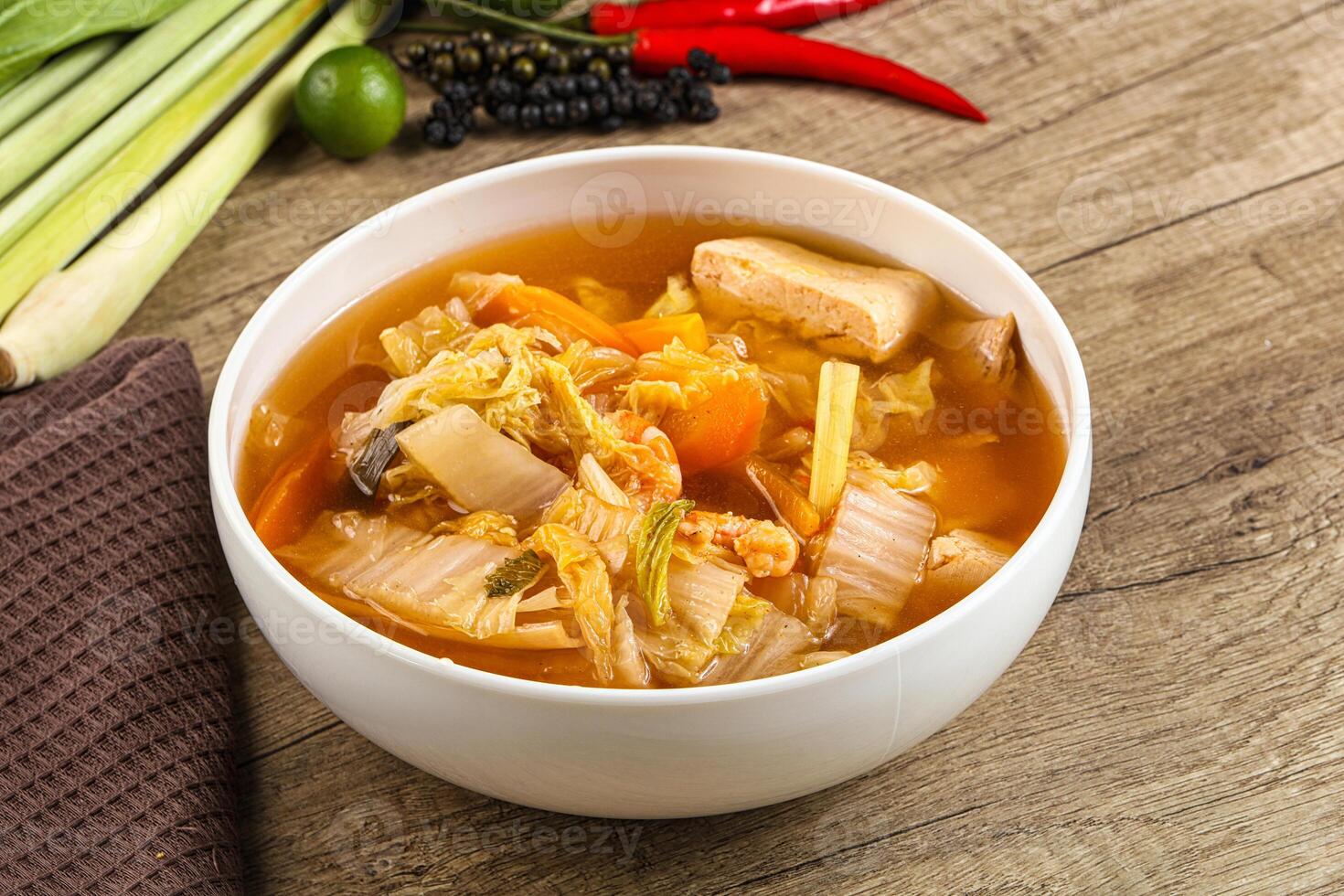 A bowl of soup on a table photo