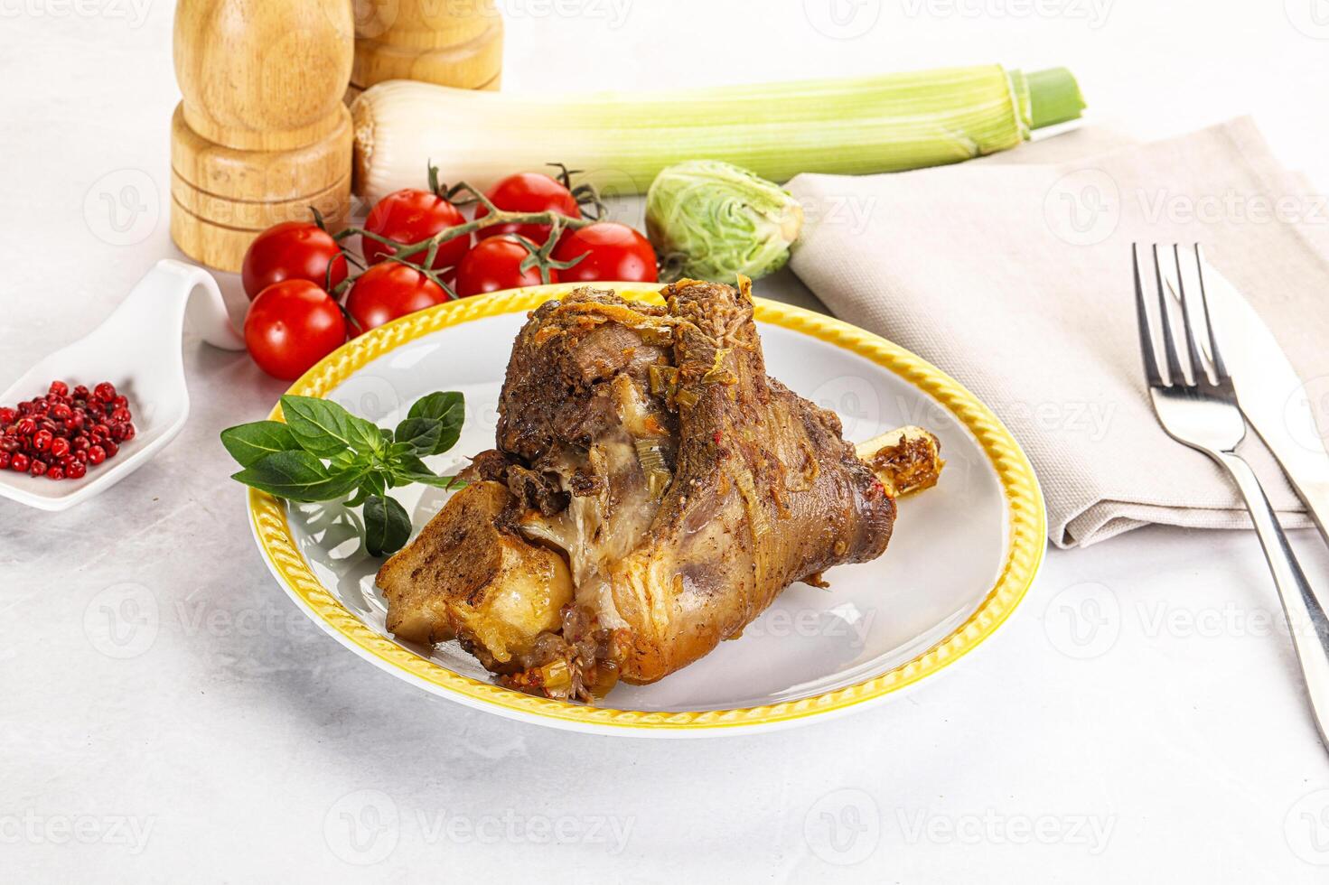 A plate with a piece of meat on it photo