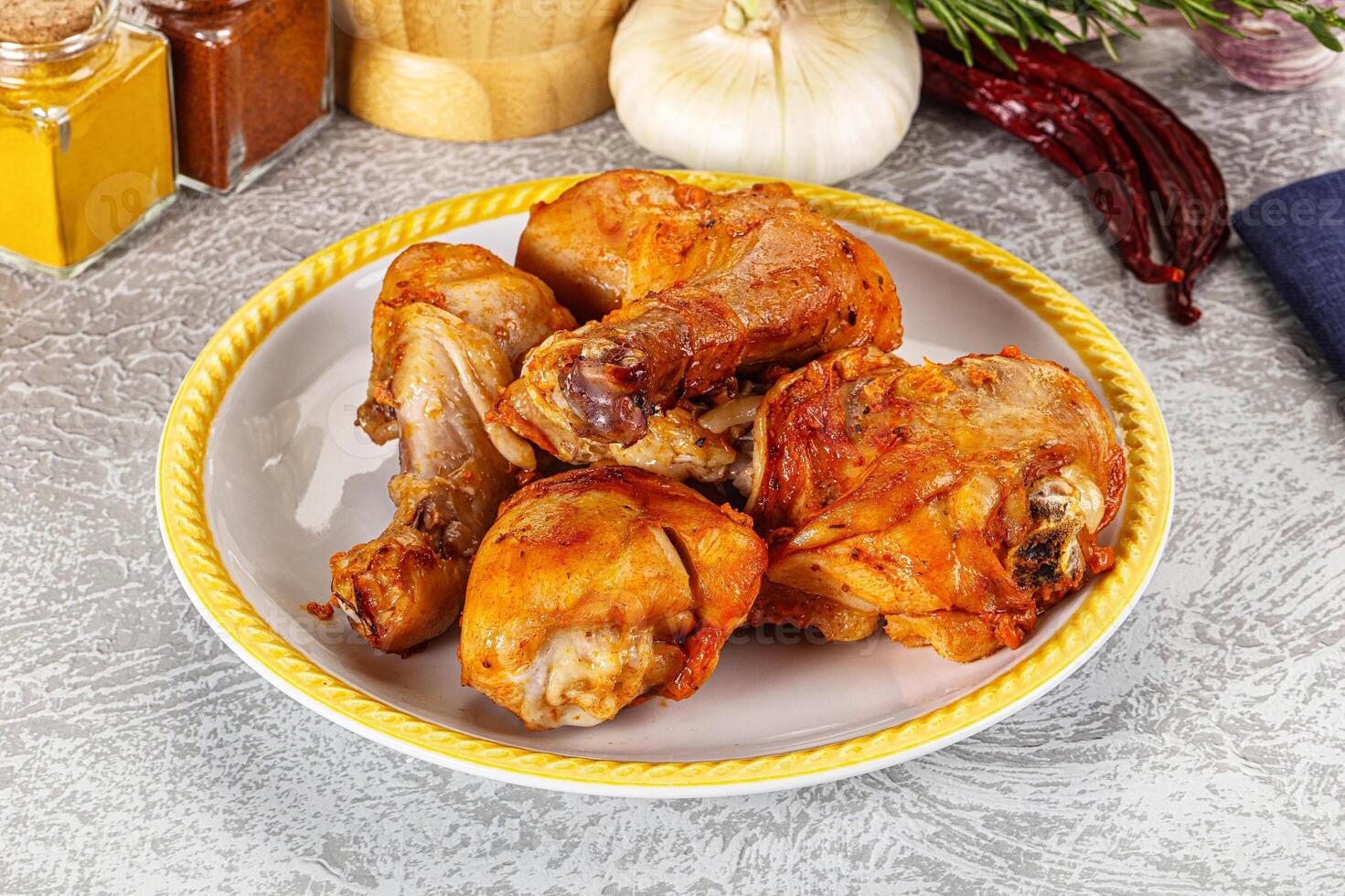 A plate of chicken wings on a table photo