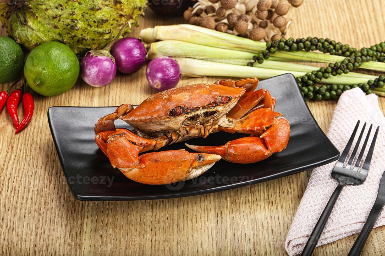 A plate of food with a crab on it photo
