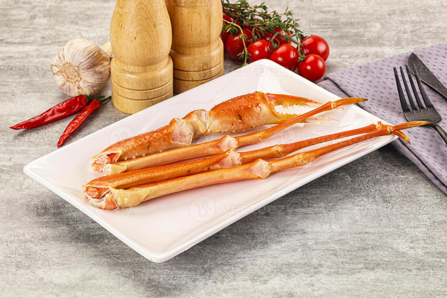 A plate with two cooked crabs on it photo