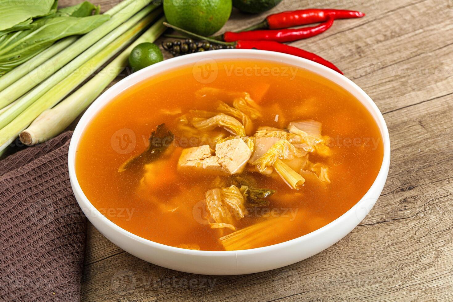 A bowl of soup on a table photo