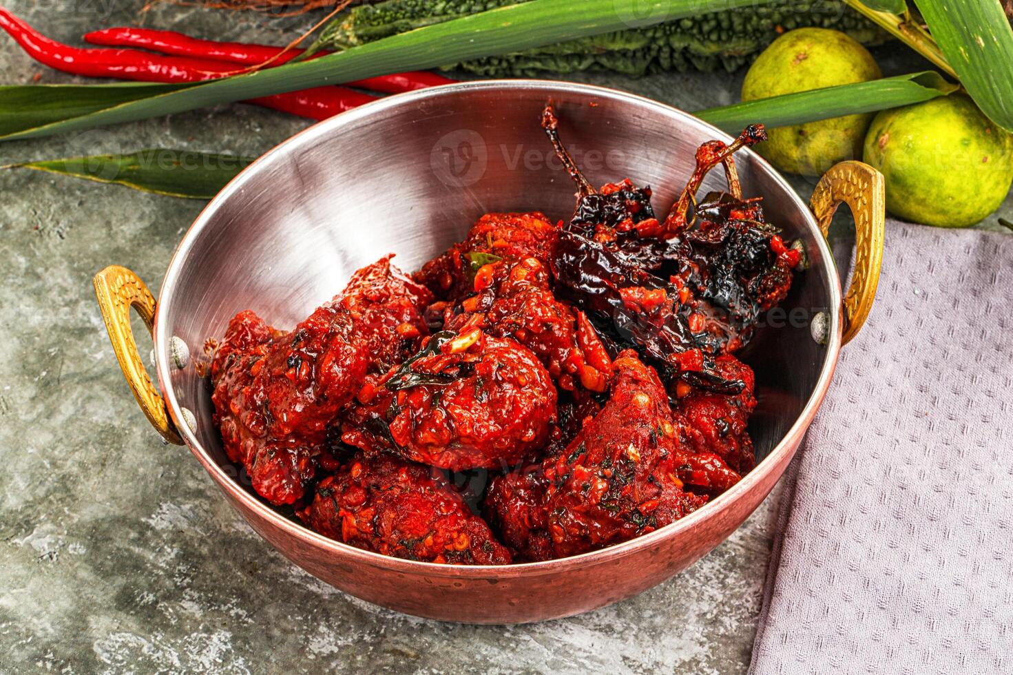 A metal bowl filled with food photo