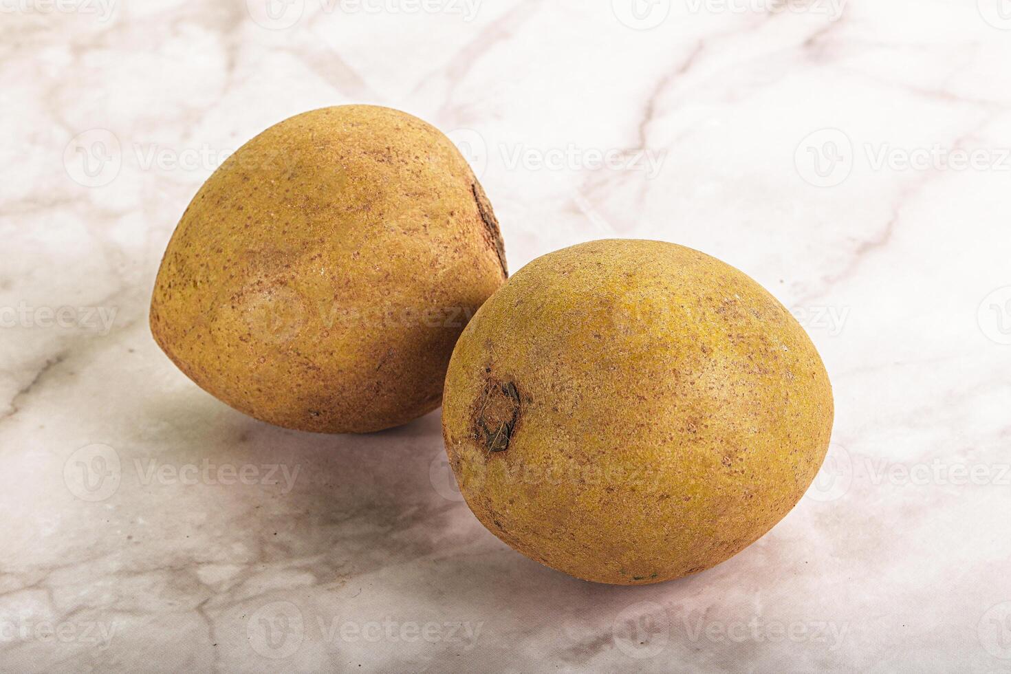 Two yellow potatoes photo