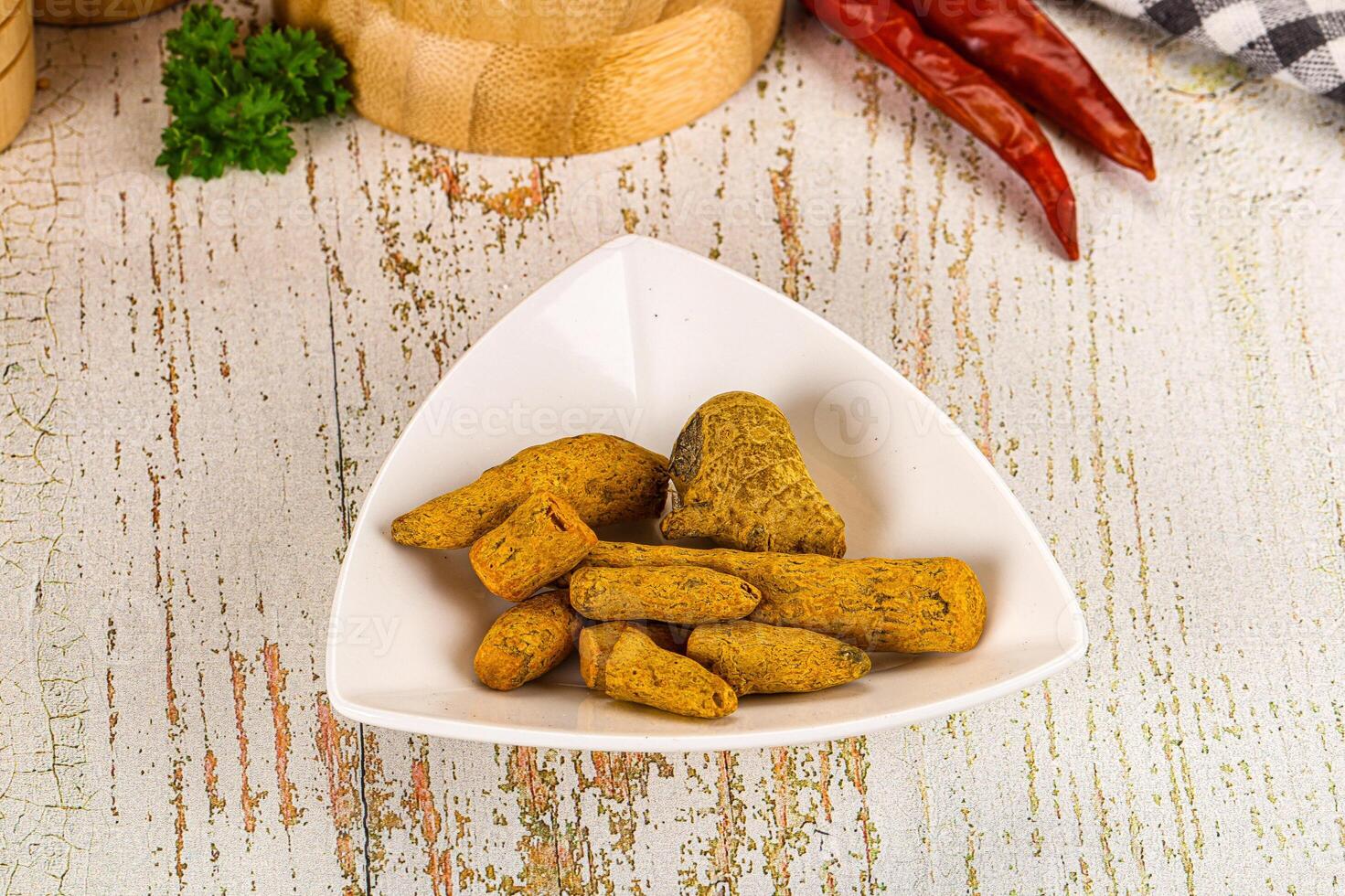 A white bowl with some food in it photo