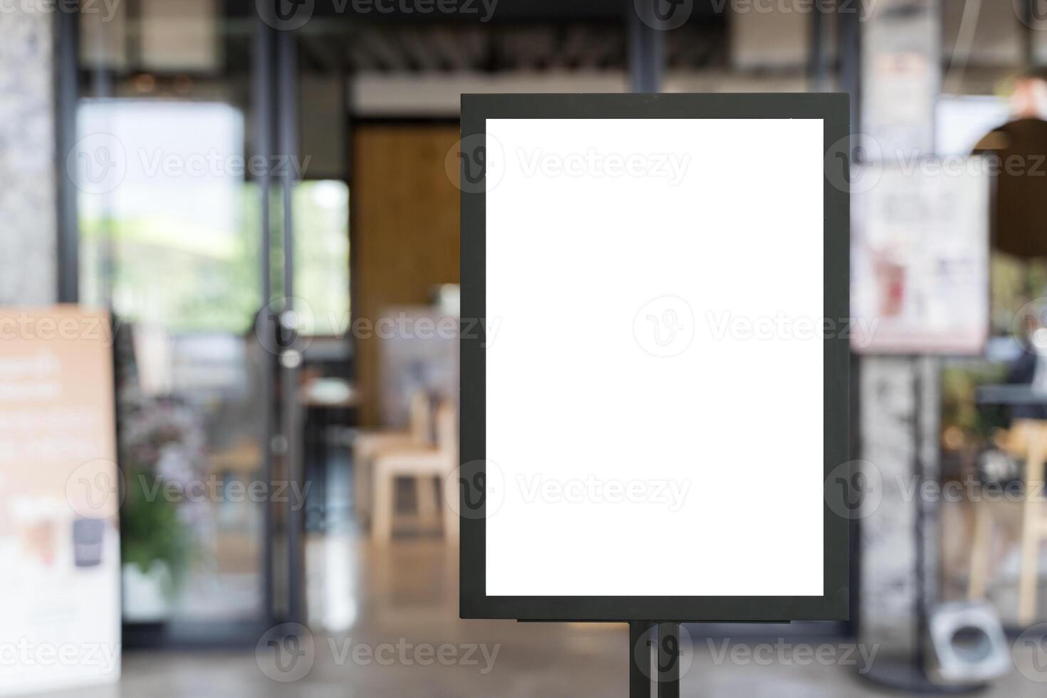 White billboards in front of the cafe. Screen digital marketing display in a Shopping Mall food court coffee shop photo