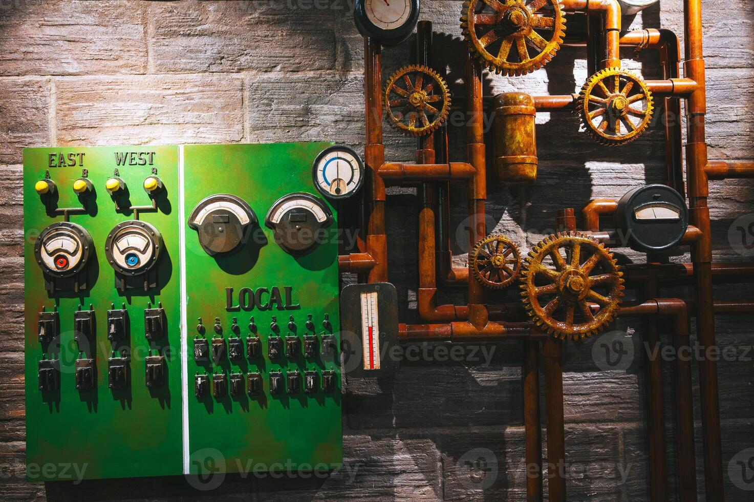 Closeup of manometer, pipes and faucet valves of heating system photo