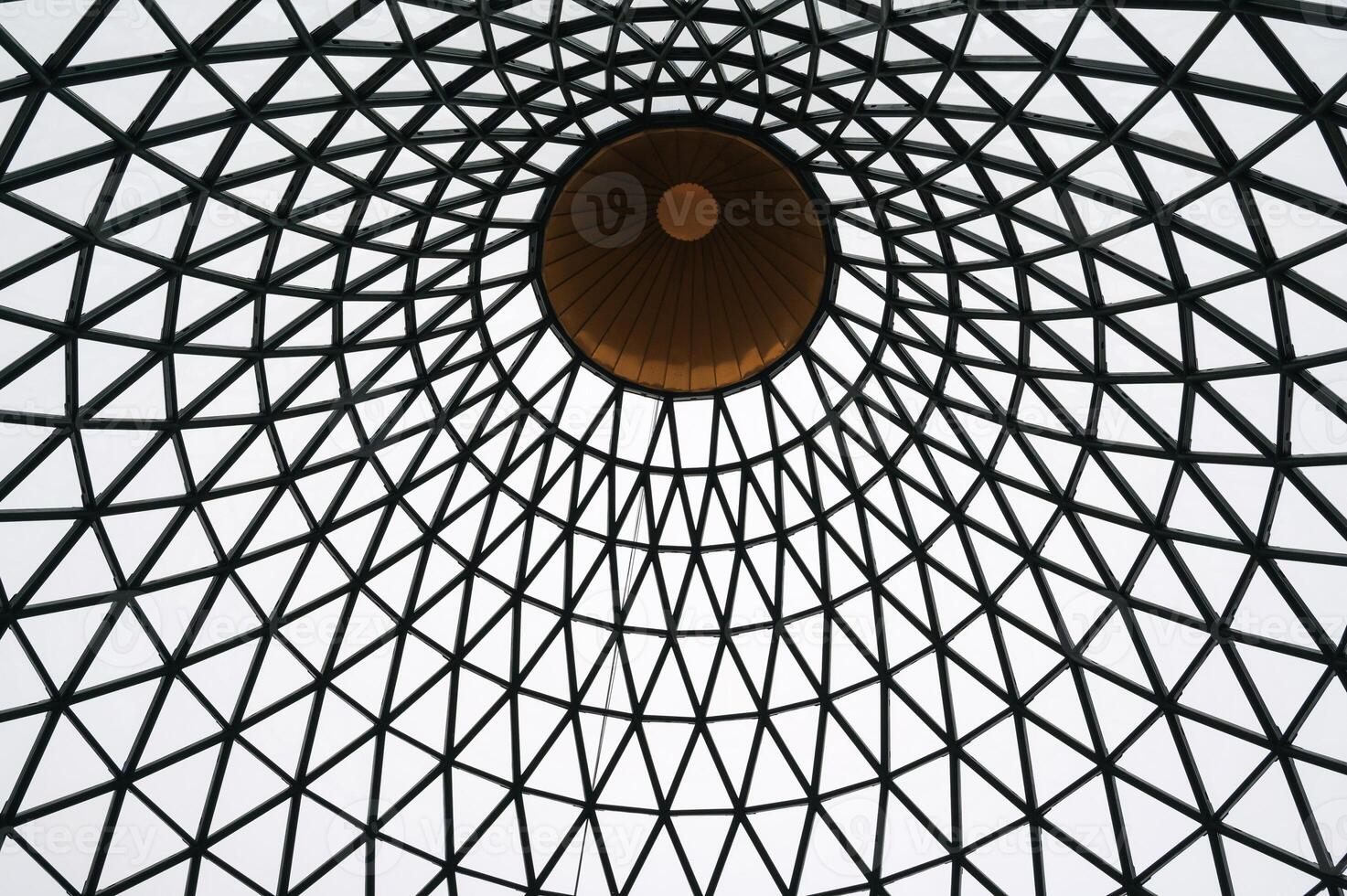 Bottom view of the iron structure of the transparent glass roof photo