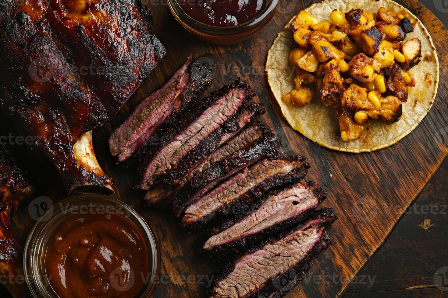Delicious smoked barbecue meat with tender brisket, ribs, and tacos photo