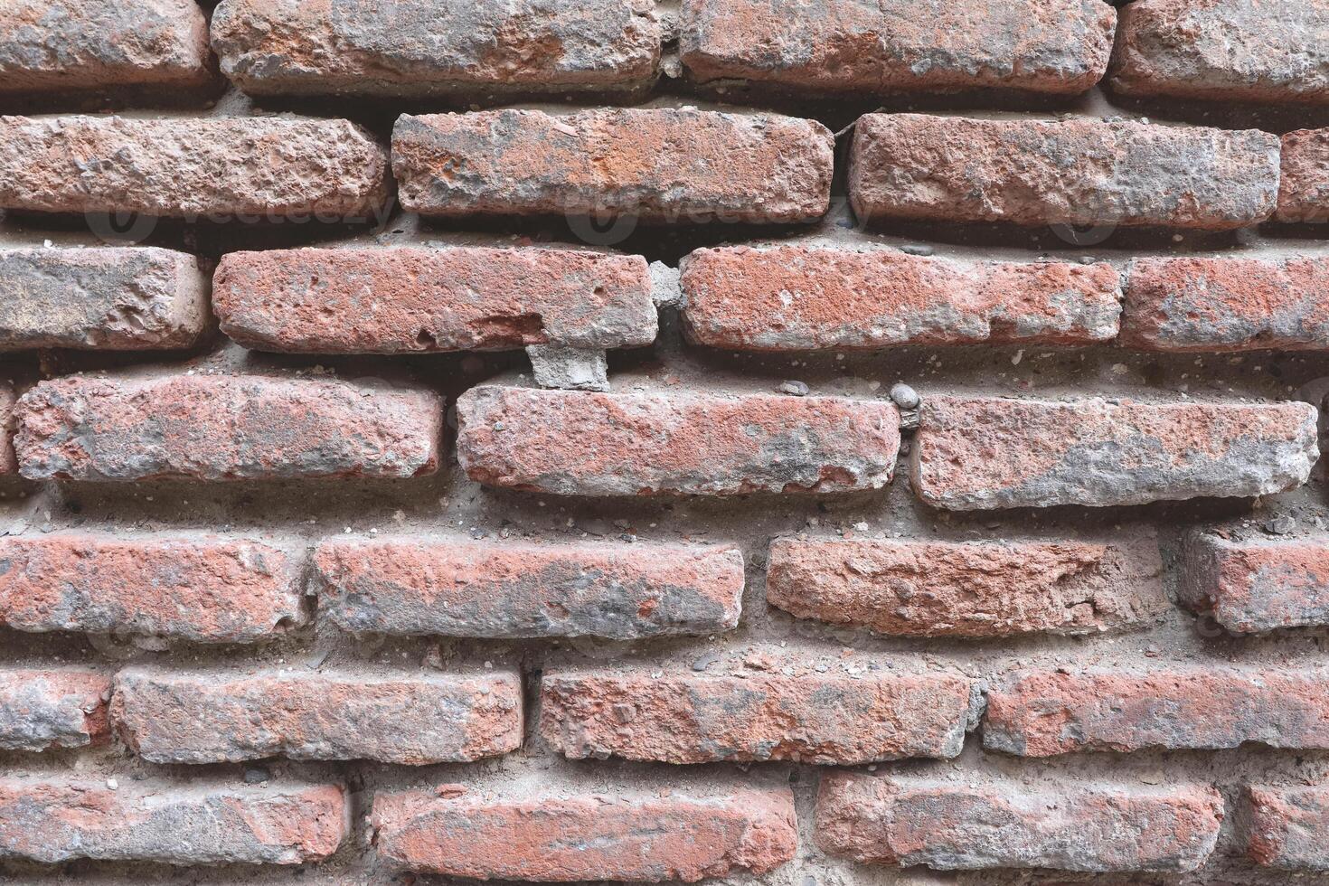 Old brick texture in close up. Bricks background. Stone texture. photo