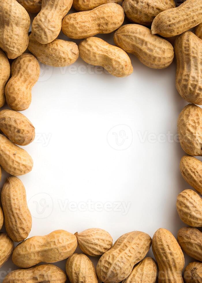 a frame made of peanuts on a white background photo