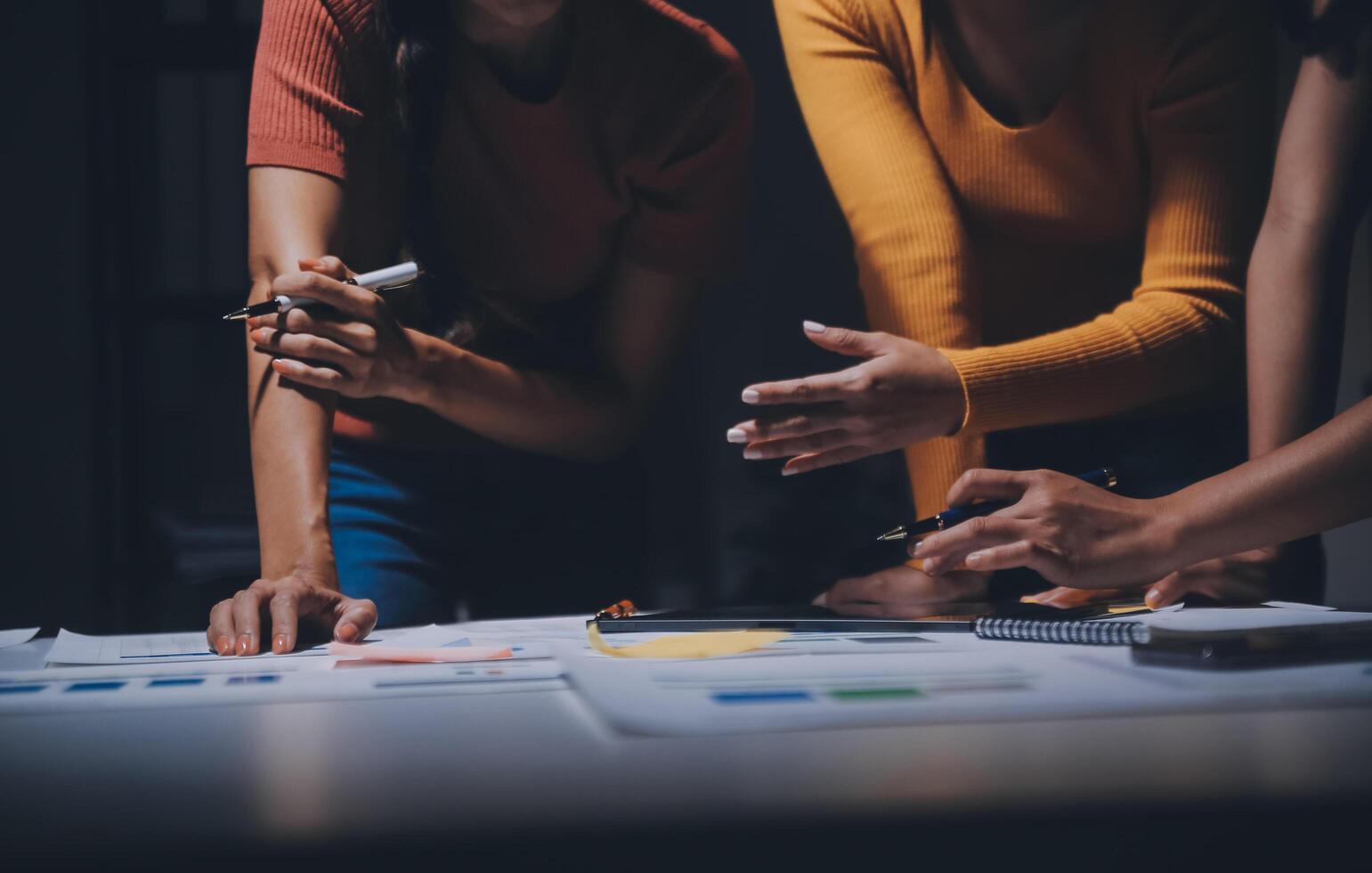 Three people working on a project together photo
