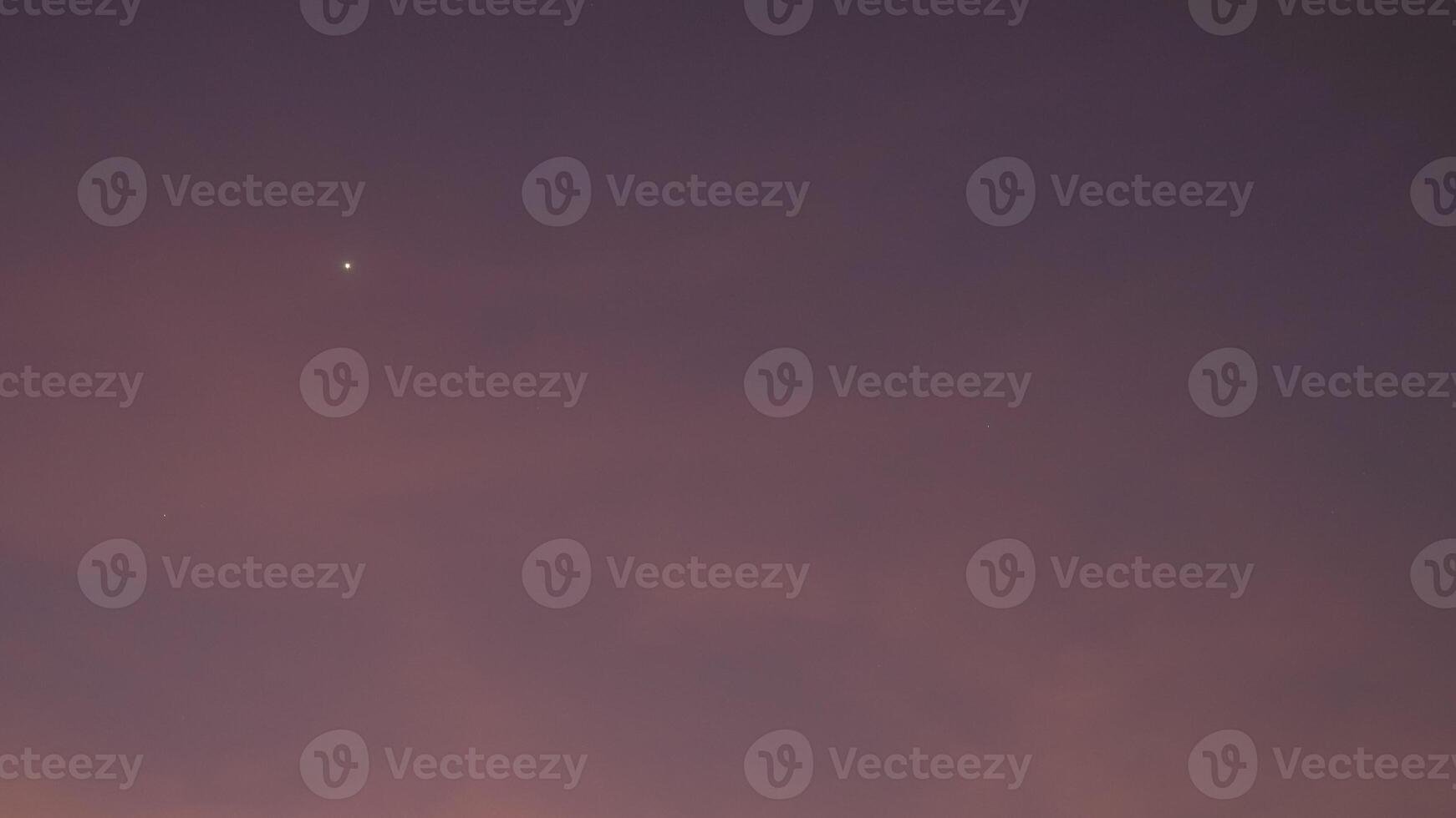 Sunset, evening sky, Beautiful clouds at dusk over the city, nature background, Beautiful dark sky and bright white stars, Colorful clouds in summer, Peaceful and beautiful sunset. photo