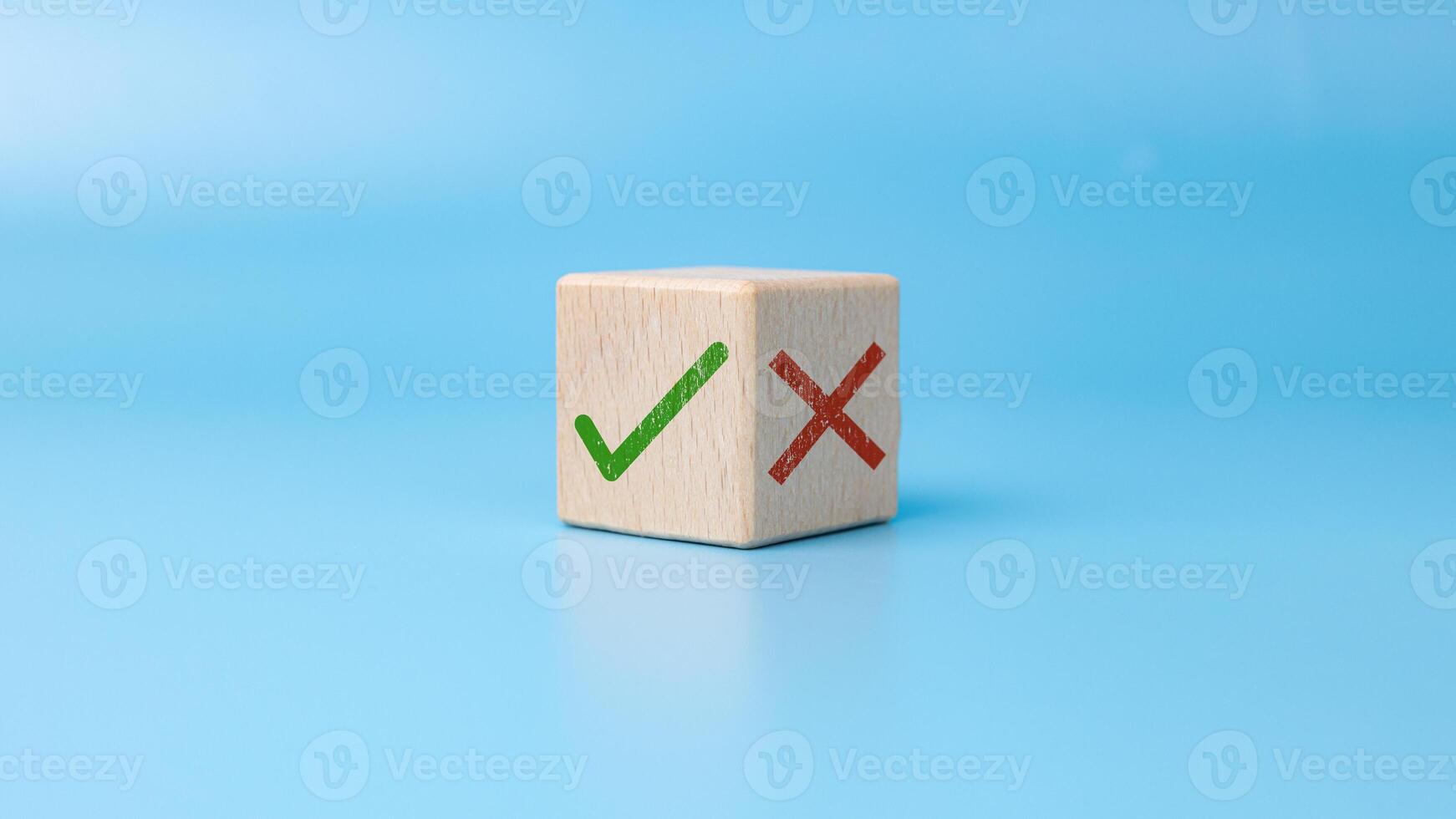 Right and wrong symbols, Green correct sign mark and red cross mark which print on wooden for approve and reject business project proposal, True and False symbols accept rejections for evaluation. photo
