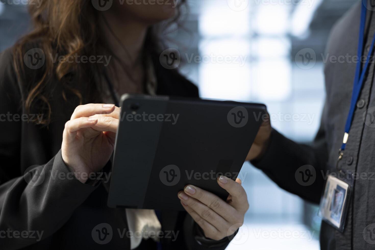 Team of technicians in data center using tablet to develop disaster recovery plans. Teamworking colleagues in server hub testing failover scenarios, protecting data during disruptions, closeup photo