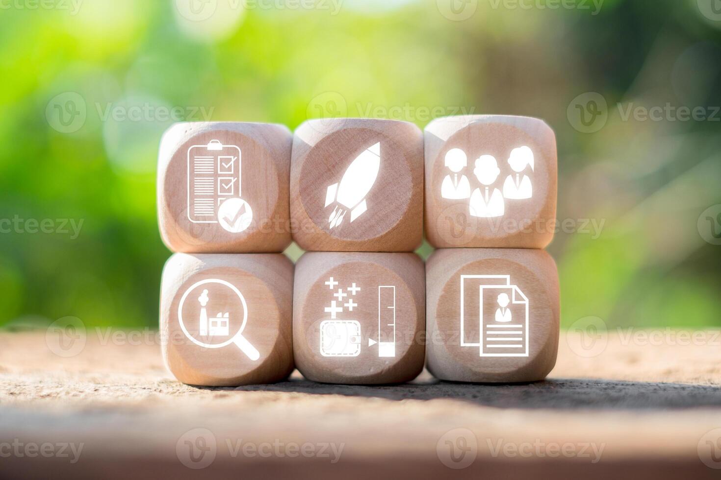 Wooden blocks with business icons symbolizing job interview concepts, teamwork, and professional growth. photo