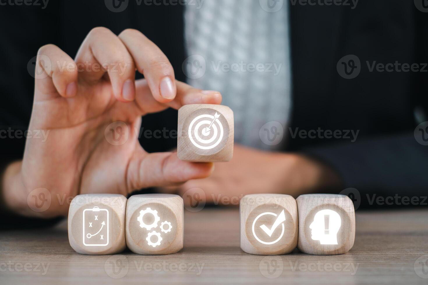 Wooden blocks illustrating the Plan Do Check Act cycle, symbolizing continuous improvement and strategic business planning. photo