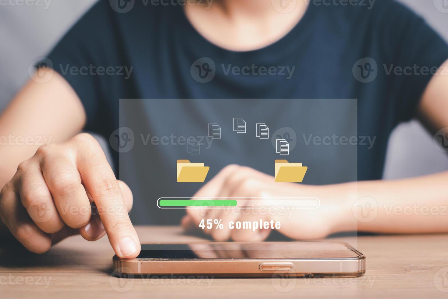 Transfer files data system relocation concept, Person hand using smart phone to waiting for transfer file process with loading bar icon on virtual screen. photo