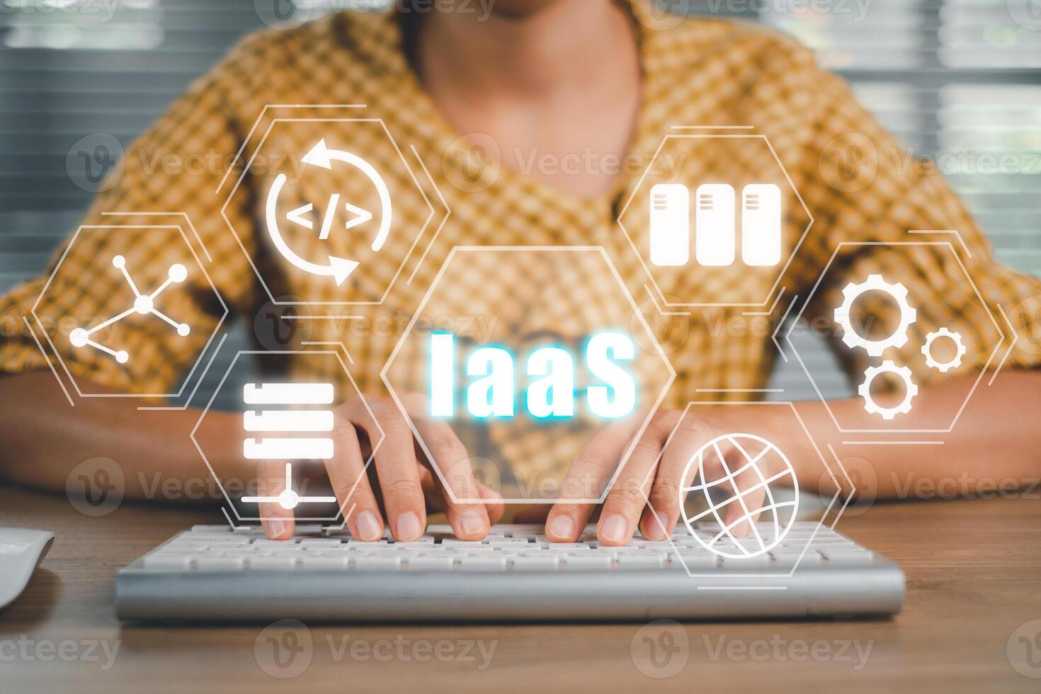 IaaS - Infrastructure as a service, Business woman hand typing keyboard computer with Infrastructure as a Service icon on VR screen, networking and application platform. photo