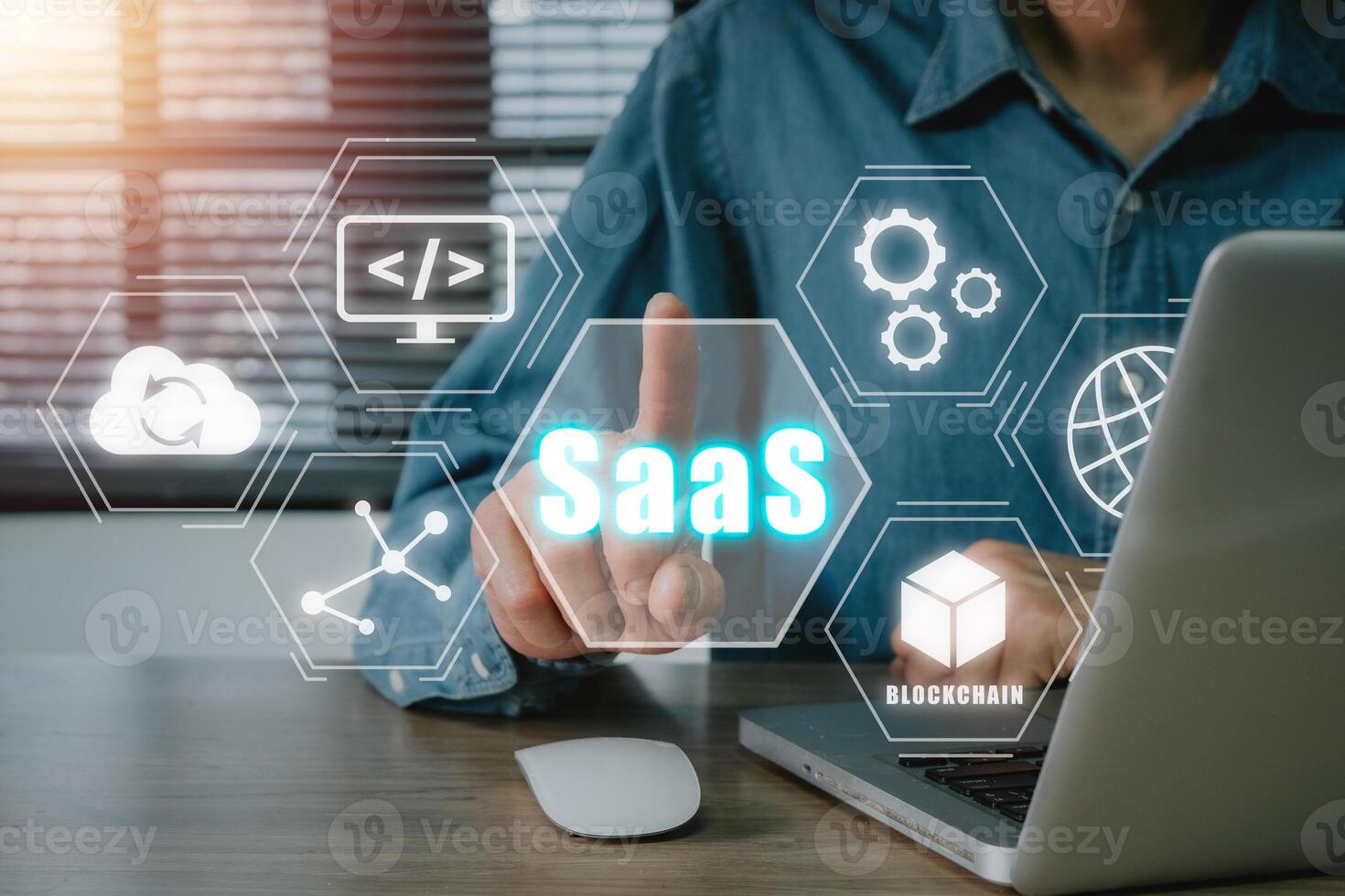 SaaS concept, software as a service, Businessman hand working on laptop to synchronize on SaaS host server to working on system for technology and business concept photo