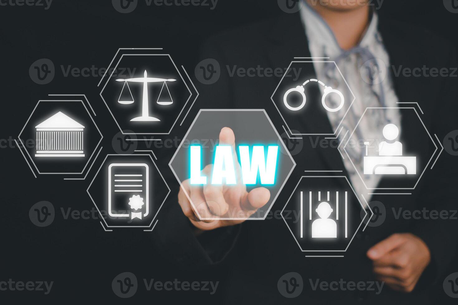 Justice and law concept, Businesswoman hand touching law icon on virtual screen on drak background. photo