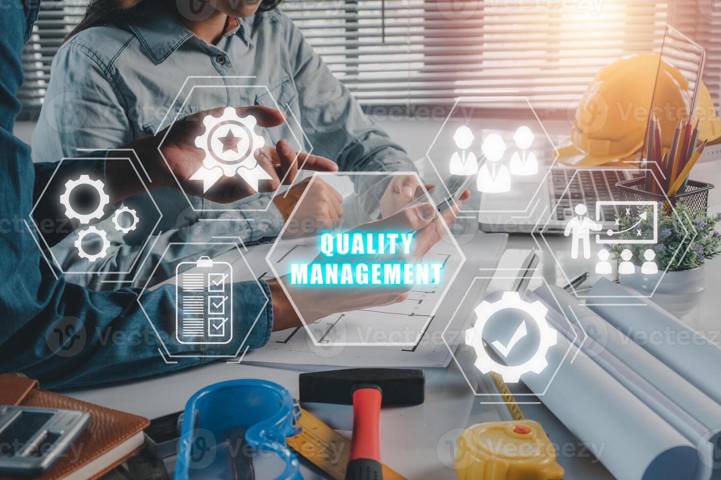 Quality management with QA, QC and improvement, Business team discussing data with document data with VR screen quality management icon on desk table. photo