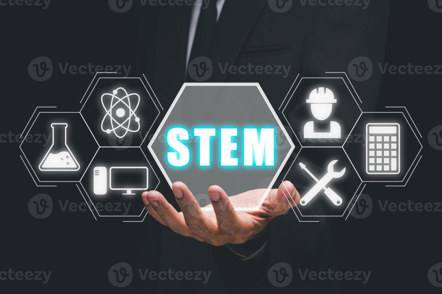 STEM concept, science, technology, engineering, mathematics, Businessman hand holding STEM icon on virtual screen. photo