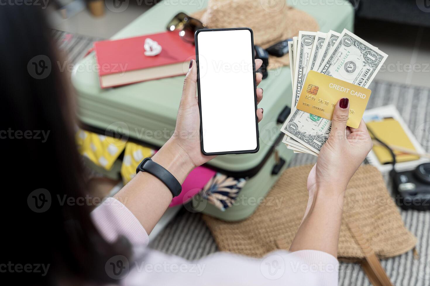 Mobile phone screen mockup, smartphone display mock-up and money, dollars. Mature woman packing. photo