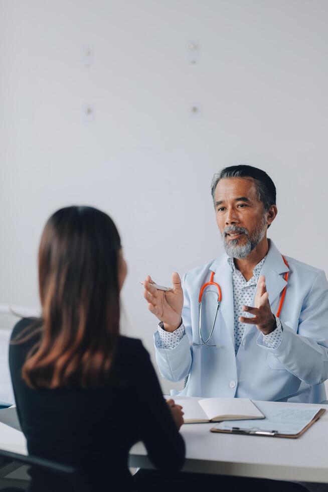 A doctor talking to a patient photo