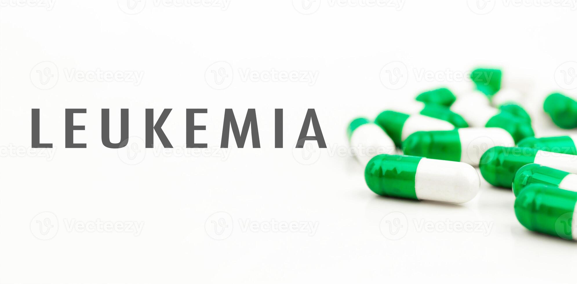 A bunch of pills with the word Leukemia written on them photo