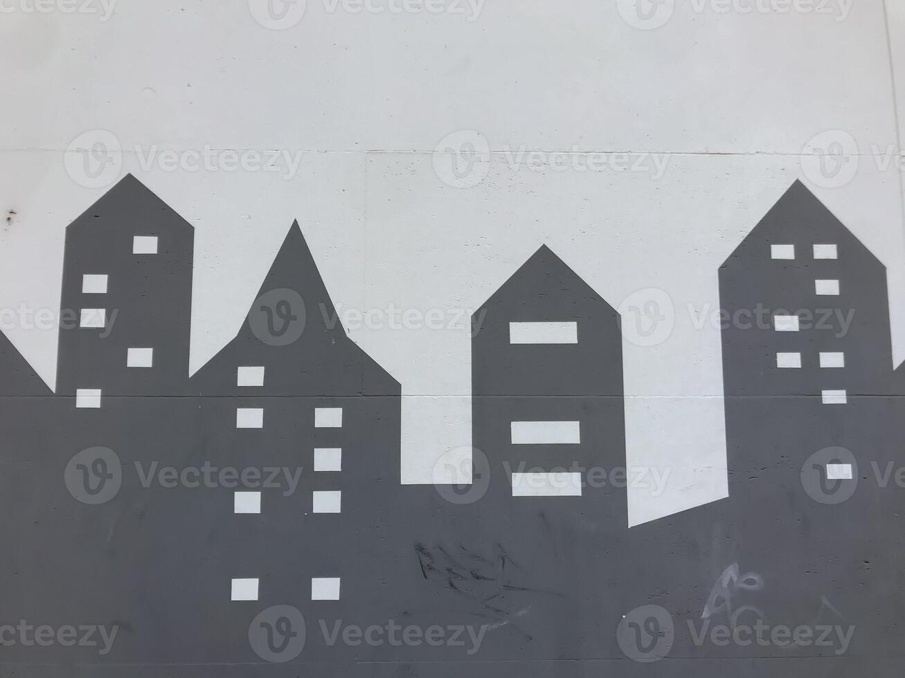 A cityscape is painted on a gray surface with a white background photo