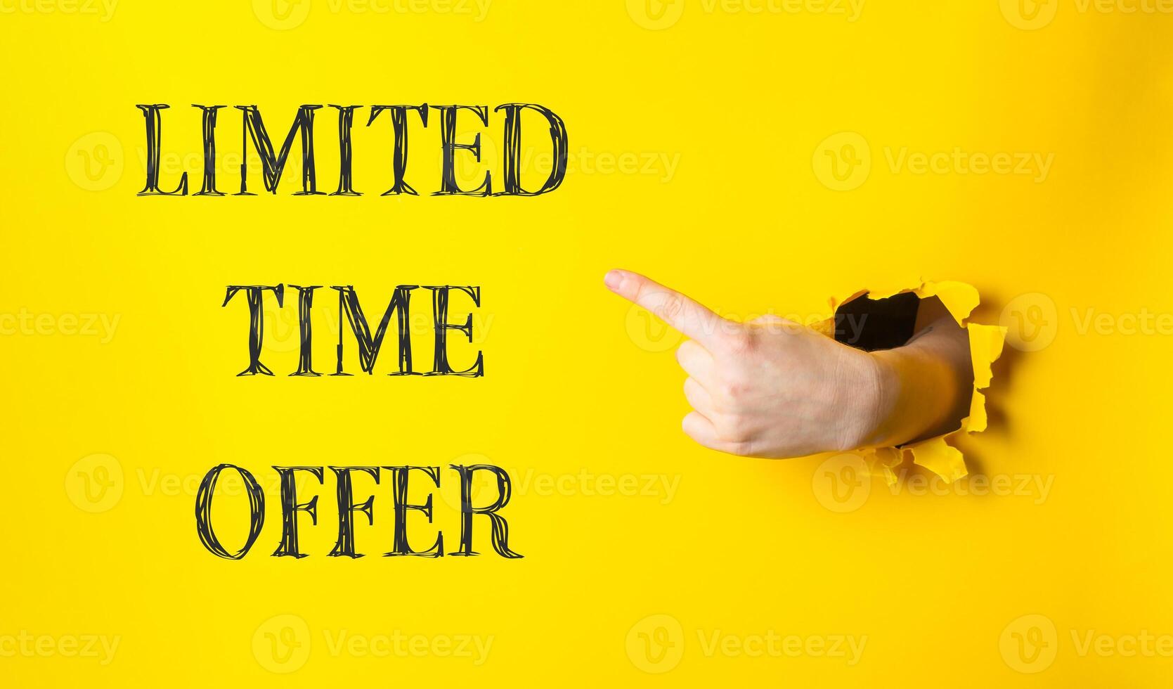 A hand pointing to a yellow background with the words limited time offer photo