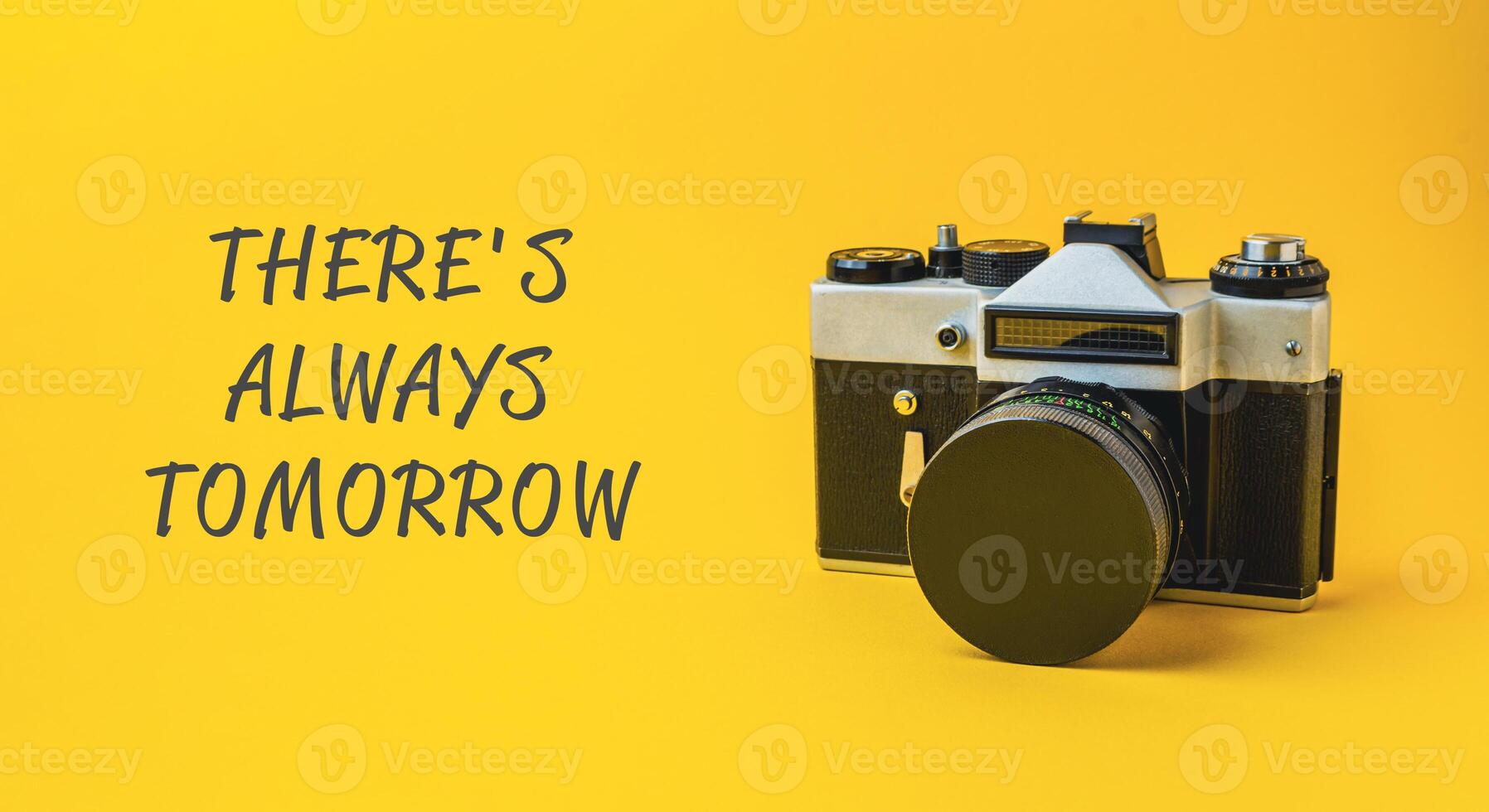 A camera is on a yellow background with the words There's always tomorrow photo