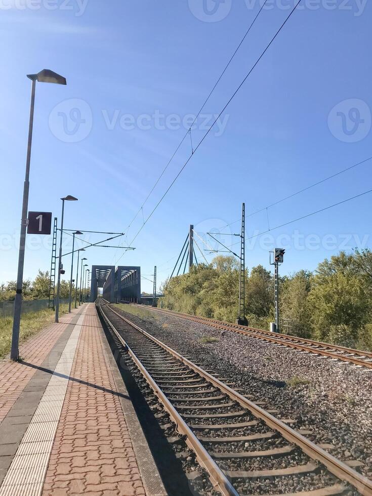 A train track with a sign that says 1 photo