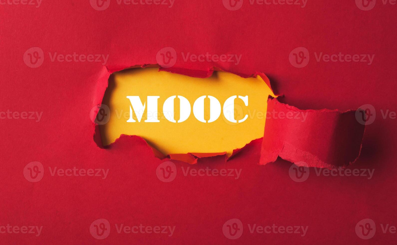A red background with a yellow border and a white word that says MOOC photo