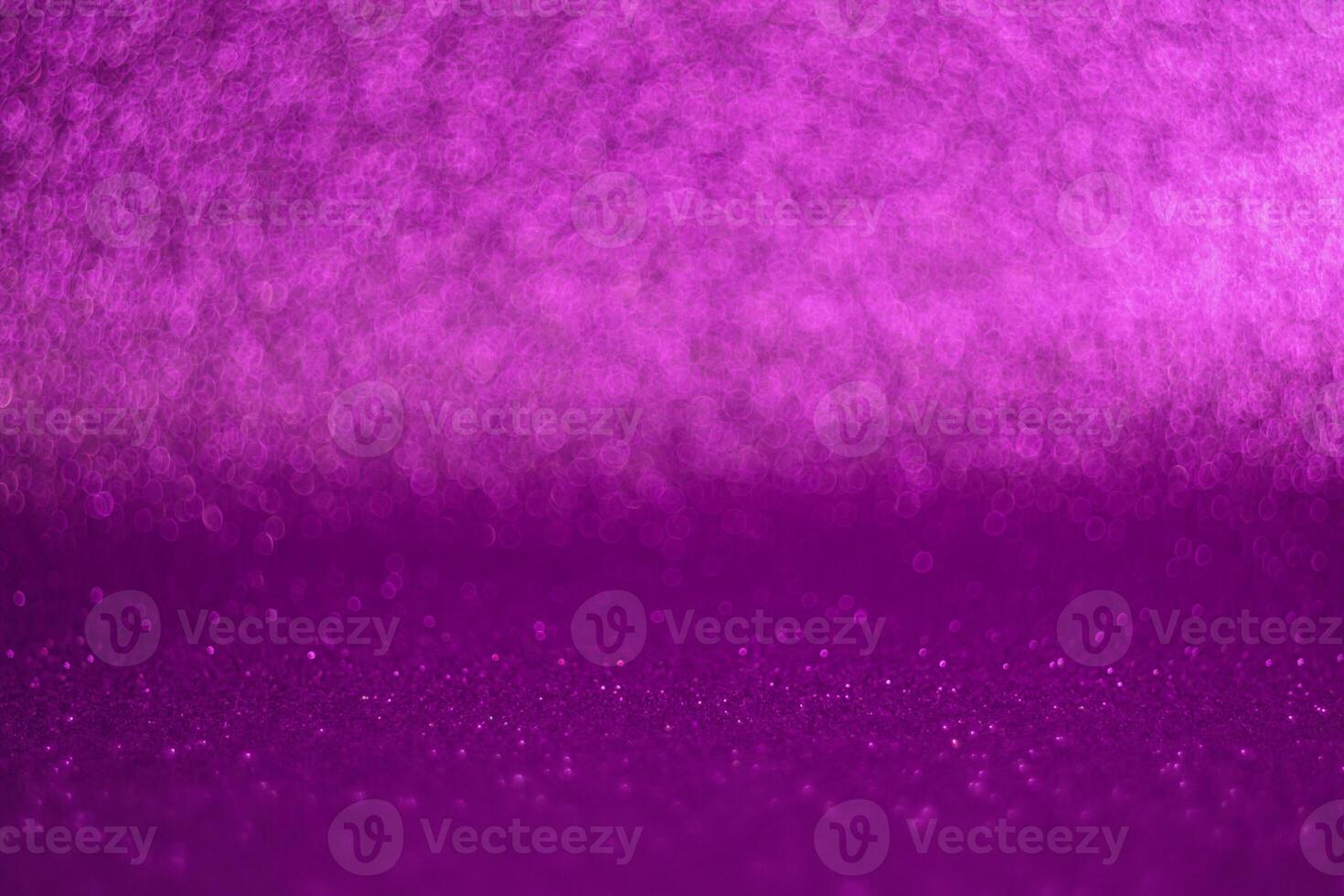 A purple background with a blurry pinkish purple background photo