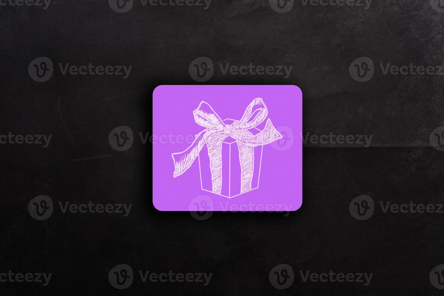 A purple box with a bow on it photo